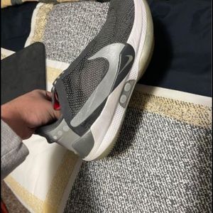 Men’s Nike Adapts. Size 10.5 very expensive shoes. Wore for senioryr. Don’t need